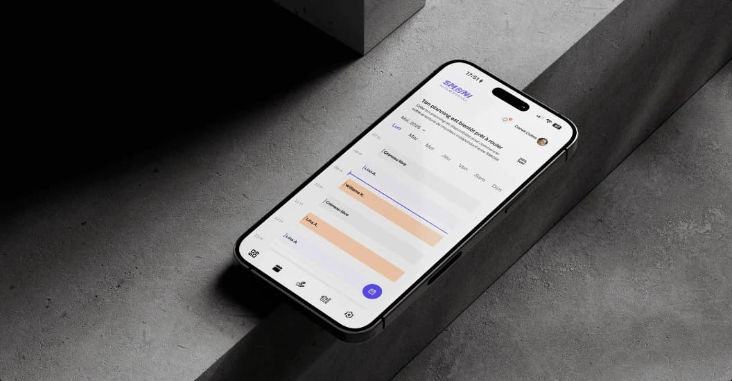 Smoni lesson planning screen on a phone lying on concrete steps